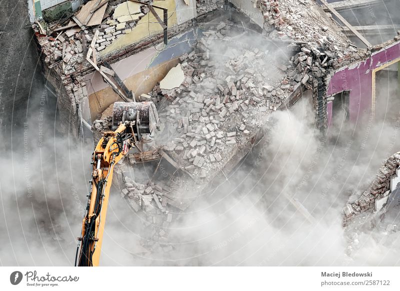 Excavator in dust cloud. House (Residential Structure) Work and employment Workplace Construction site Machinery Construction machinery Ruin Building Transience