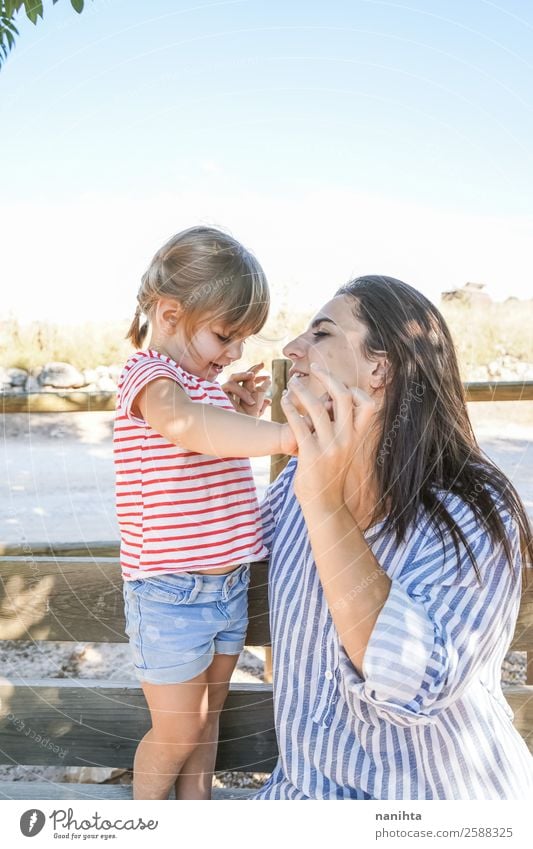 Mom and her daughter in the park Lifestyle Wellness Well-being Relaxation Human being Feminine Child Toddler Girl Young woman Youth (Young adults) Woman Adults