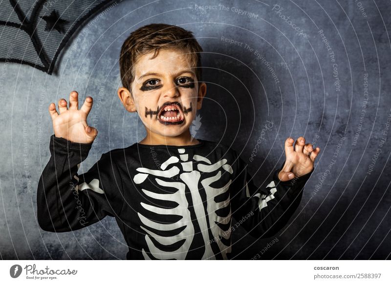 Little kid in a skeleton costume on Halloween Carnival Joy Happy Face Make-up Feasts & Celebrations Hallowe'en Fairs & Carnivals Child Human being Toddler
