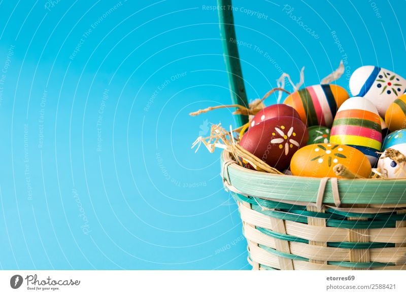 Easter eggs in a basket on blue background Egg Colour Vacation & Travel Feasts & Celebrations Public Holiday Background picture Guest Decoration Festive Well