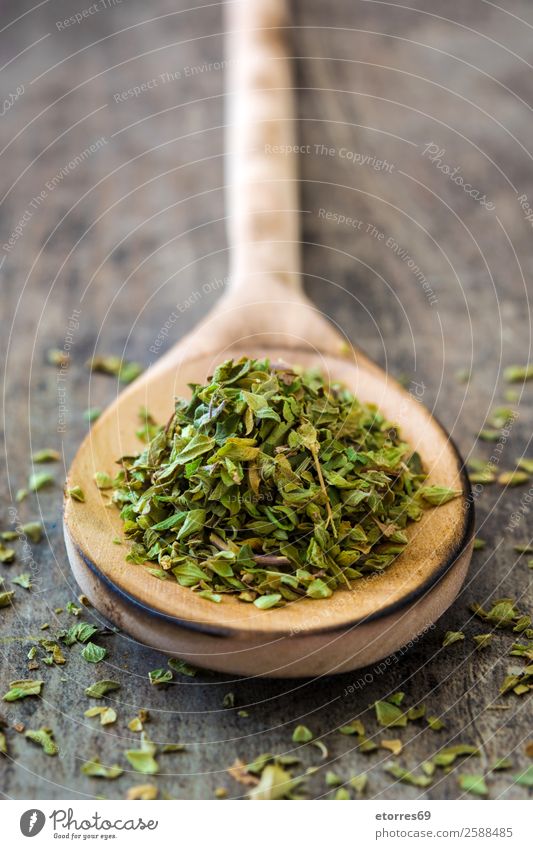 Oregano on wooden spoon on wooden background Herbs and spices Spoon Food Healthy Eating Food photograph Green Ingredients Wood Aromatic bio Vegan diet
