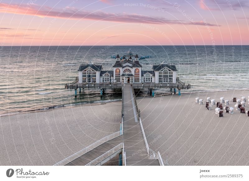 Sellin pier at dusk Deep depth of field Twilight Evening Exterior shot Colour photo beach chair Rügen Idyll Horizon Calm White Black Blue already