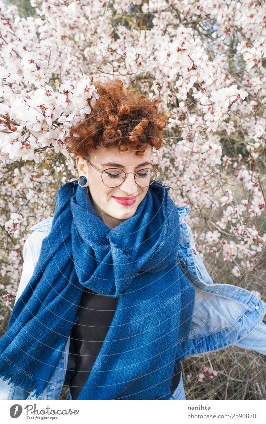 Young redhead woman surrounded by flowers Lifestyle Style Joy Happy Beautiful Hair and hairstyles Freedom Human being Feminine Young woman Youth (Young adults)