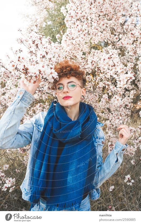 Young redhead woman surrounded by flowers Lifestyle Style Joy Happy Beautiful Hair and hairstyles Freedom Human being Feminine Young woman Youth (Young adults)