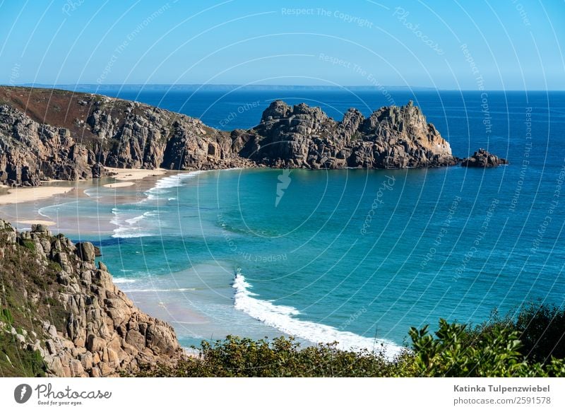 Granite cliffs and beach of Porthcurno, Cornwall Environment Nature Landscape Elements Sand Water Sky Horizon Autumn Beautiful weather Rock Peak Waves Coast