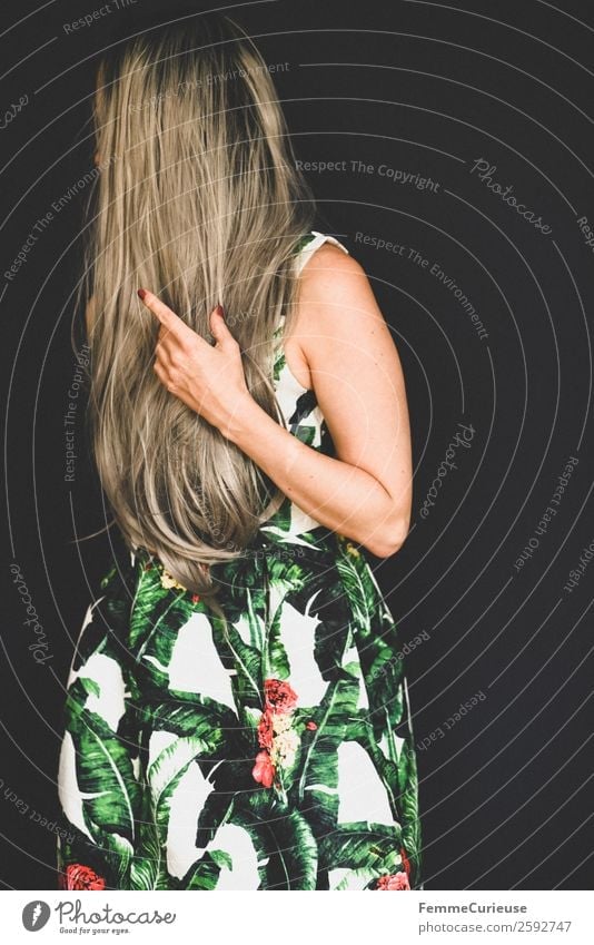 Woman with long grey dyed hair in a palm print dress Elegant Style Feminine Young woman Youth (Young adults) Adults 1 Human being 18 - 30 years 30 - 45 years