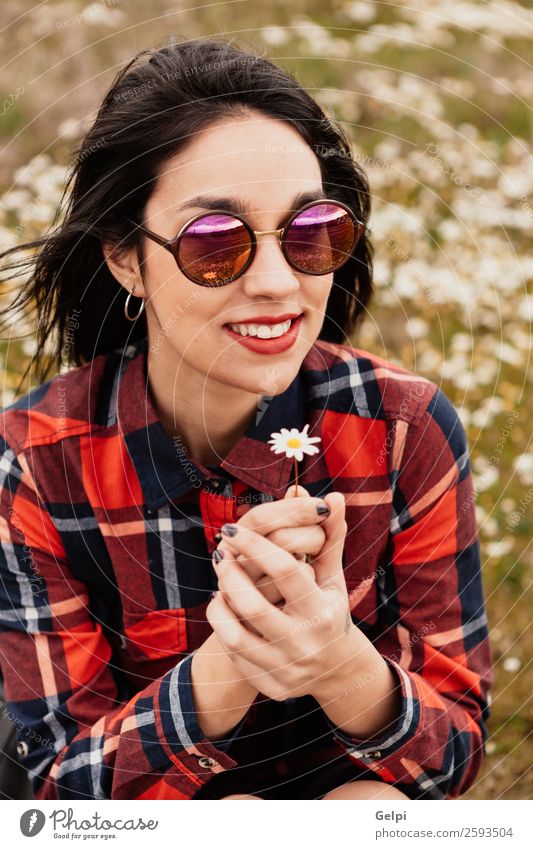 Brunette girl Lifestyle Joy Happy Beautiful Face Wellness Relaxation Human being Woman Adults Nature Sky Flower Grass Blossom Park Meadow Sunglasses Smiling Sit