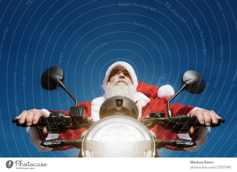 Santa Claus on the motorcycle Joy Winter Christmas & Advent Human being Masculine Man Adults Facial hair 45 - 60 years Motorcycle Blue Red Motorcyclist