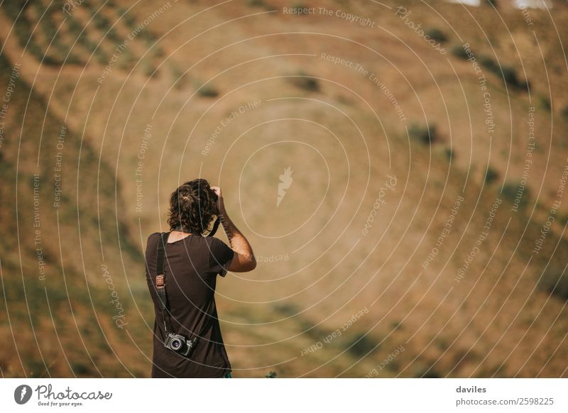 Man photographing nature. Lifestyle Vacation & Travel Adventure Summer Mountain Human being Masculine Young man Youth (Young adults) Adults Back 1 18 - 30 years