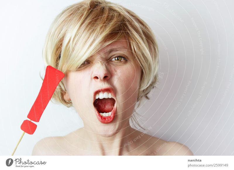 Angry young woman holding a exclamation mark Human being Feminine Woman Adults Youth (Young adults) 1 18 - 30 years Blonde Sign Scream Rebellious Strong Anger