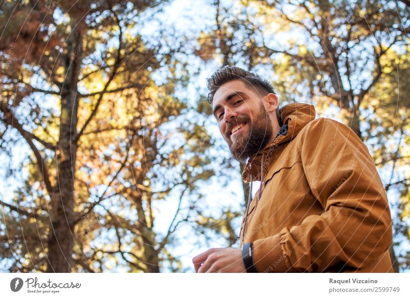 Portrait of a smiling man with autumnal background. Life Vacation & Travel Hiking Young man Youth (Young adults) 1 Human being 18 - 30 years Adults Nature