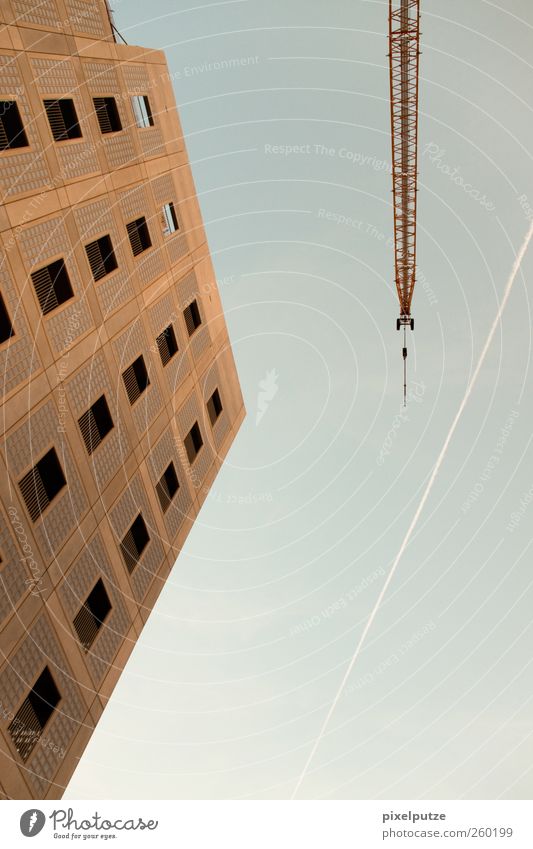 growing new buildings II Skyline Deserted High-rise Architecture Window Tall Modern Town Crane Build Construction site Vapor trail Colour photo Exterior shot