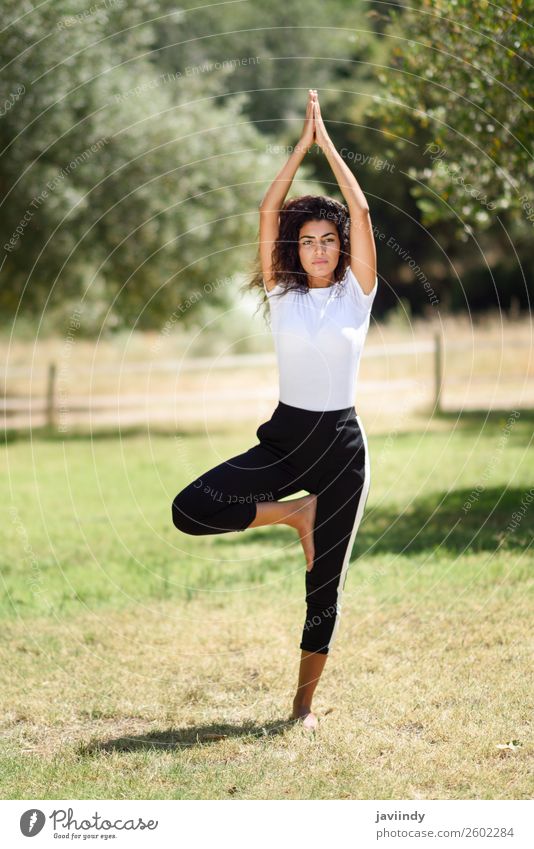 Young and Beautiful Woman Doing Yoga Exercises .Yoga Background Stock Photo  - Image of caucasian, park: 34501560