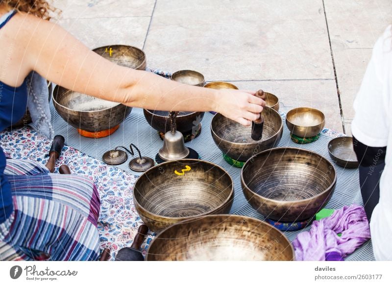 Hand playing yoga bowls outdoors. Bowl Lifestyle Medical treatment Alternative medicine Wellness Relaxation Meditation Spa Playing Music Yoga Human being Street