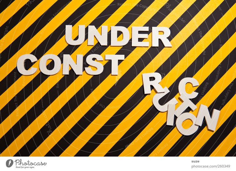 Title in progress Design Construction site Characters Signage Warning sign Stripe Funny Yellow Black White Idea Creativity Striped Warning label