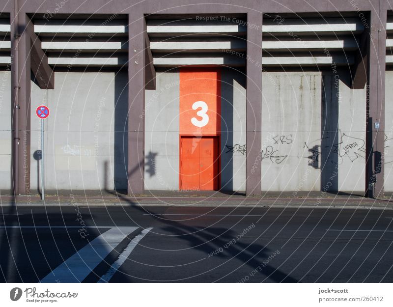 All good things come in threes at a grandstand Building Architecture Stands Column Transport Traffic infrastructure Street Traffic light Road sign Graffiti Line