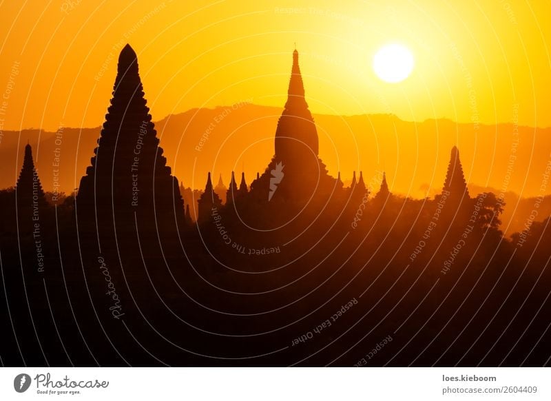 Silhouettes of Burmese Pagodas during sunset, Bagan, Myanmar Vacation & Travel Tourism Adventure Far-off places Sightseeing Summer Nature Sun Sunrise Sunset