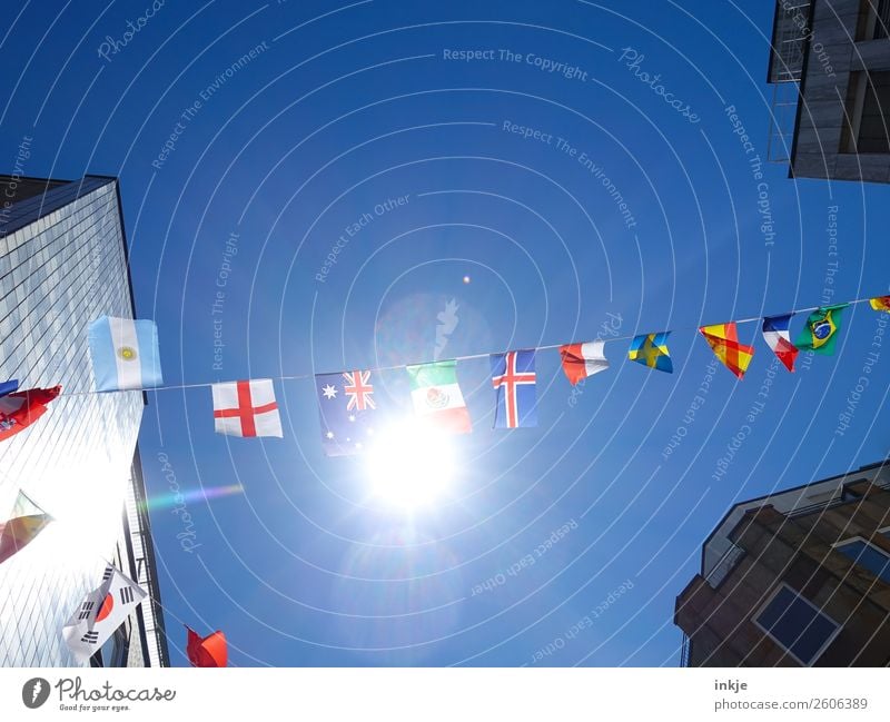 Flag in the wind 2 Sky Cloudless sky Sun Sunlight Beautiful weather Town Deserted House (Residential Structure) High-rise Decoration Ensign Paper chain Blue