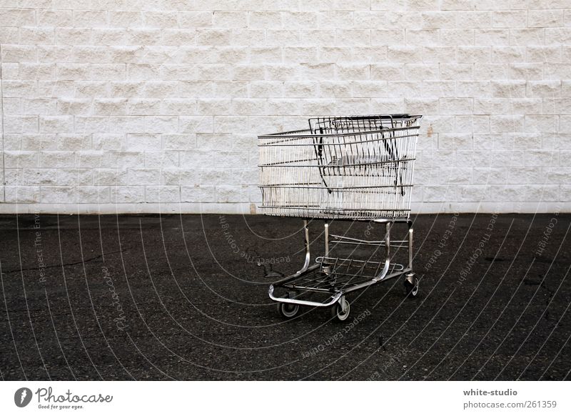 There's nothing in my trolley Shopping Stone Trashy Gloomy Luxury Capitalism Consumption consumer society Shopping Trolley Poverty Pavement Street Tramp