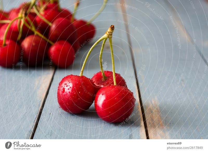 Delicious cherries on a blue wooden table Cherry Fruit Dessert Food Healthy Eating Food photograph Snack Baked goods Home-made Sweet Baking Summer Red Diet