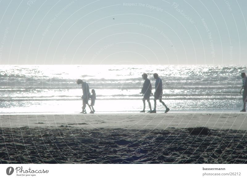 A Walk at the Beach Ocean Pacific Ocean Cannon Beach Oregon Back-light Human being To go for a walk Sandy beach Horizon Walk on the beach Pedestrian Tourism