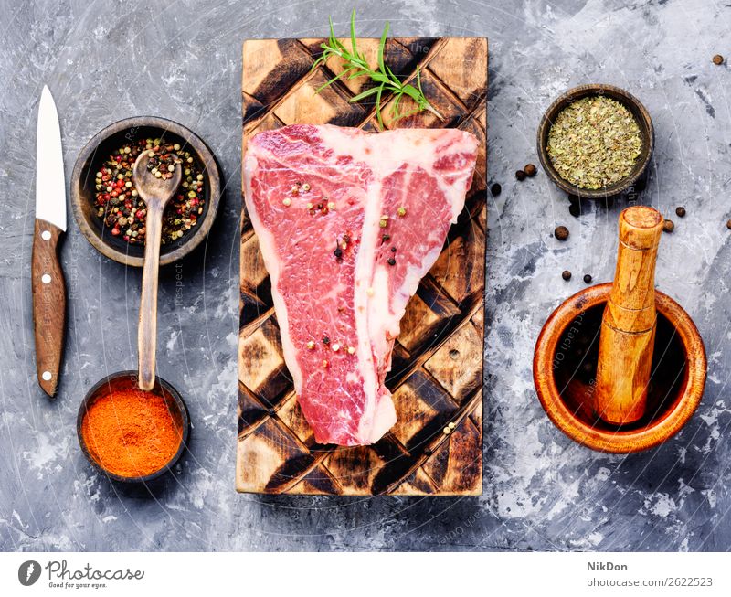 Raw beef meat red steak fresh raw food uncooked pepper spice fillet cut rosemary board butcher tenderloin protein product seasoning eating veal sirloin