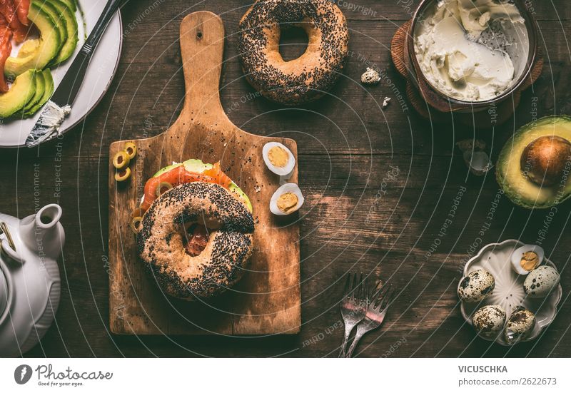 Breakfast with bagel bread roll Food Roll Nutrition Style Design Living or residing Bagel Background picture Sandwich Snack Salmon Avocado Quail's egg