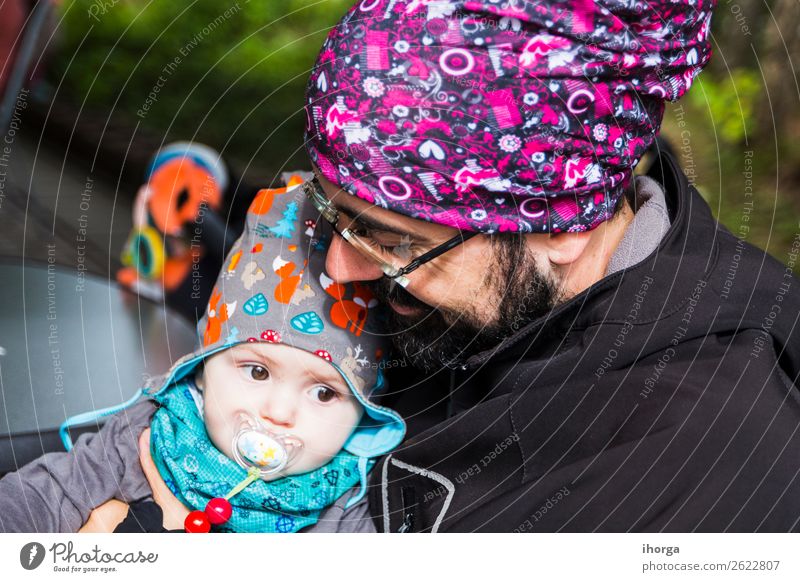 A father with his baby in his arms Lifestyle Vacation & Travel Tourism Adventure Summer Mountain Hiking Sports Child Baby Toddler Boy (child) Man Adults Parents