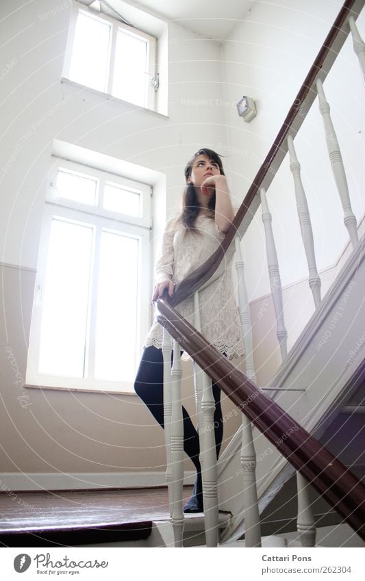 waiting. Flat (apartment) Staircase (Hallway) Stairs Banister Handrail Window Period apartment Old building Feminine Young woman Youth (Young adults) Woman