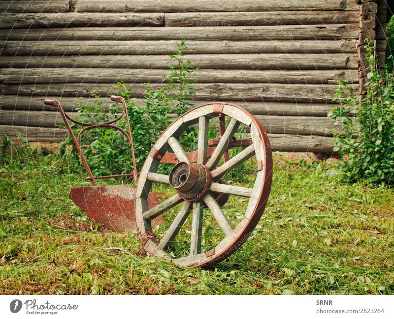 wheel and plough Grass Village Wood Rust Old Historic Retro Nostalgia agricultural Ancient Antique Cartwheel country Grunge Object photography Old fashioned