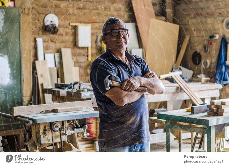 Portrait of senior carpenter. Standing in his workshop and looking at camera. Shopping Happy Work and employment Craftsperson Industry Craft (trade) Human being