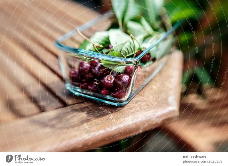 cherries Food Fruit Dessert Cherry Nutrition Organic produce Vegetarian diet Diet Fasting Plate Bowl Summer Sun Leaf Table Wooden table Glass Fresh Delicious