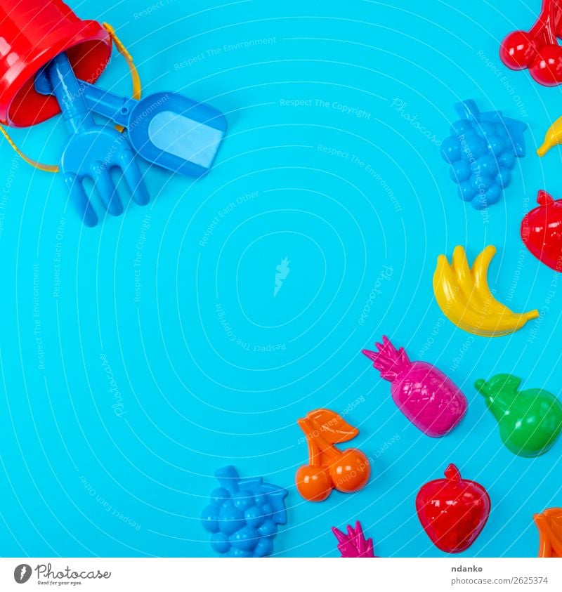 Blue Background With Childrens Colorful Toys A Royalty Free