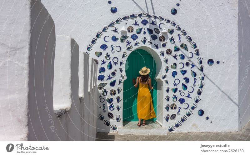 Woman in a decorated arabic door. Lifestyle Style Vacation & Travel Tourism Trip City trip Summer Summer vacation Sun Adults 1 Human being 18 - 30 years