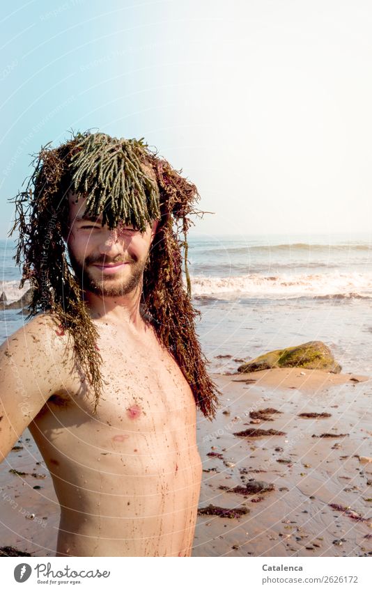 Fresh from the hairdresser Man Beach smilingly bunkum fun Algae Headwear Sand Wet Water Waves Summer Relaxation coast Ocean Vacation & Travel Sandy beach