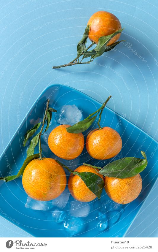 Fresh tangerines in season. Food Fruit Orange Vegetarian diet Diet Juice Healthy Eating Art Natural Blue Green citrus Detox Mature vitamins Organic