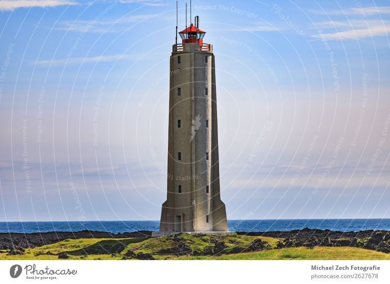 a view to the lighthouse near arnarstap in summer Vacation & Travel Tourism Sightseeing Summer Ocean Waves Mountain Hiking Nature Landscape Sky Horizon Grass