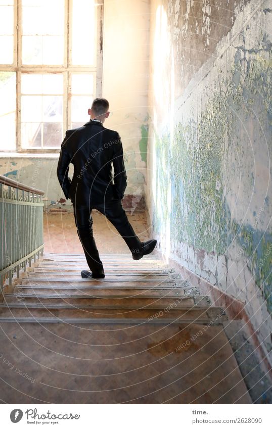 Staircase joke - man in suit strolling down a staircase in a lost place Masculine Man Adults 1 Human being Ruin Architecture Wall (barrier) Wall (building)