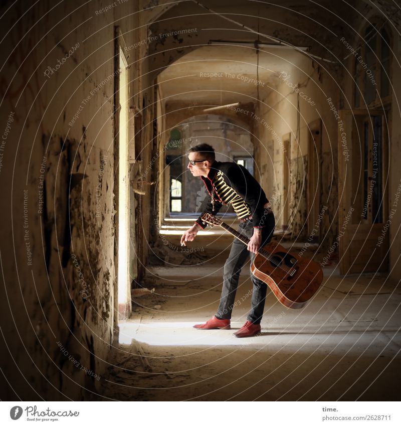 GuitarMan Hallway Masculine Adults 1 Human being Music Musician Ruin Architecture lost places Pants Jacket Sunglasses Brunette Short-haired Observe To hold on