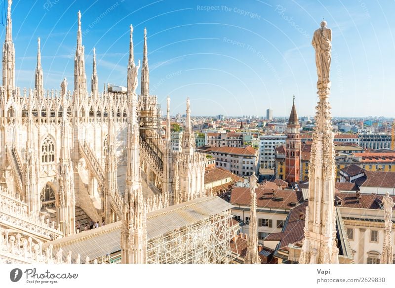 White statue on top of Duomo cathedral Vacation & Travel Tourism Trip Sightseeing City trip Summer Decoration Sculpture Architecture Sky Clouds Town Church Dome
