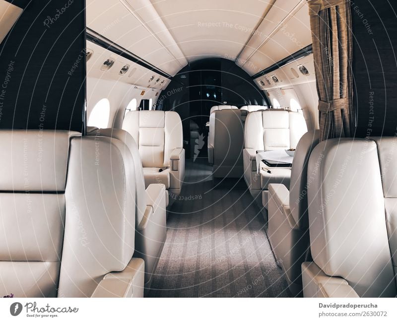 Interior of a private luxury jet Aircraft Aviation Airplane Airport Business business class Close-up Comfortable comfy Copy Space Empty Exclusive Expensive