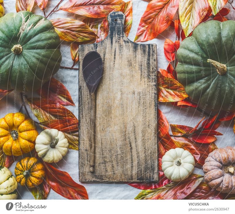 Background with pumpkins, chopping board and cooking spoon Food Vegetable Nutrition Organic produce Vegetarian diet Style Design Healthy Eating