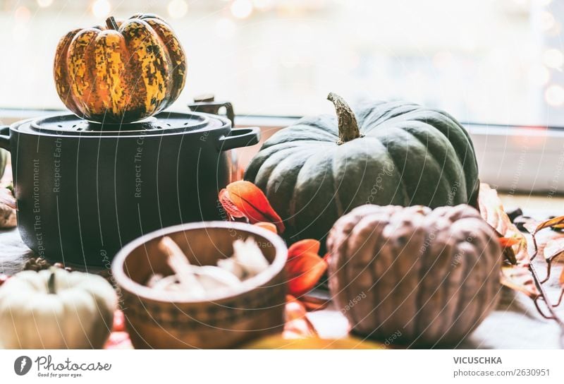 Saucepan and pumpkins on the kitchen table at the window Food Vegetable Nutrition Pot Design Healthy Eating Winter Living or residing Kitchen Autumn