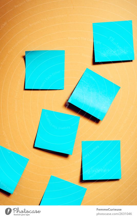 Notes on a neutral orange background Stationery Paper Piece of paper Communicate Empty self-adhesive sticking Blue Orange meaningless Colour photo Studio shot