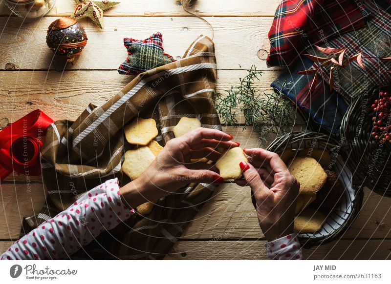 Woman keeping Christmas cookies, Photographed from above Dessert Style Beautiful Decoration Table Christmas & Advent Human being Feminine Adults Hand 1 Package