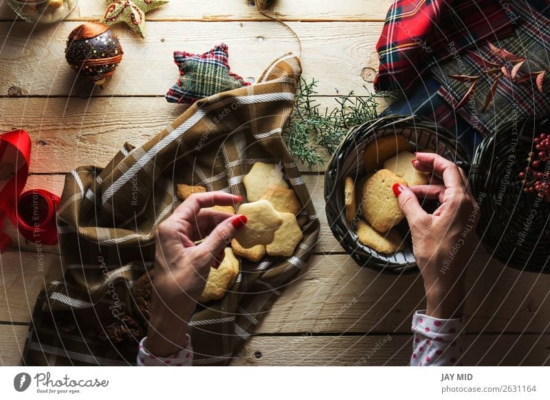 Woman keeping Christmas cookies, Photographed from above Dessert Style Beautiful Decoration Table Christmas & Advent Human being Feminine Adults Hand 1
