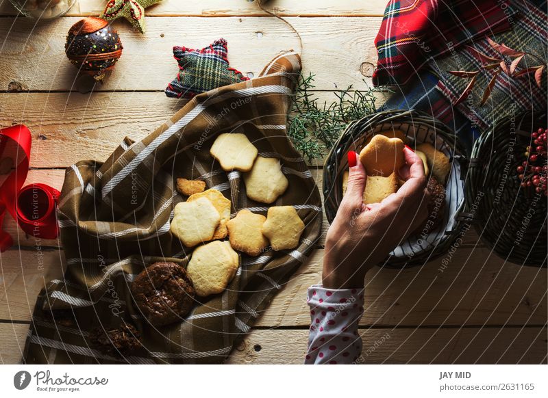 Woman keeping Christmas cookies, Photographed from above Dessert Style Beautiful Decoration Table Christmas & Advent Adults Hand Fingers 1 Human being Package