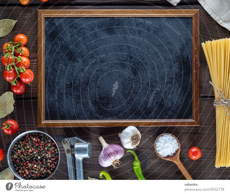 empty black frame and ingredients for cooking pasta Vegetable Dough Baked goods Herbs and spices Italian Food Spoon Blackboard Wood Line Fresh Large Long Above