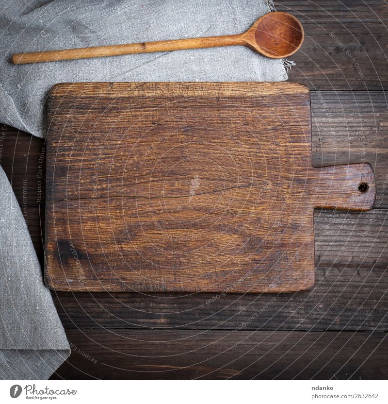 empty old brown wooden cutting board and spoon Spoon Table Kitchen Work and employment Tool Nature Wood Metal Old Retro Brown utensil background blade Blank