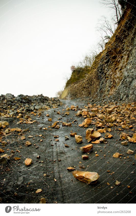 heavy rockfall on a mountain road. Rockfall Street Environment stones peril impassable Lanes & trails Gravel road Transport Risk of accident Stone Lie Threat